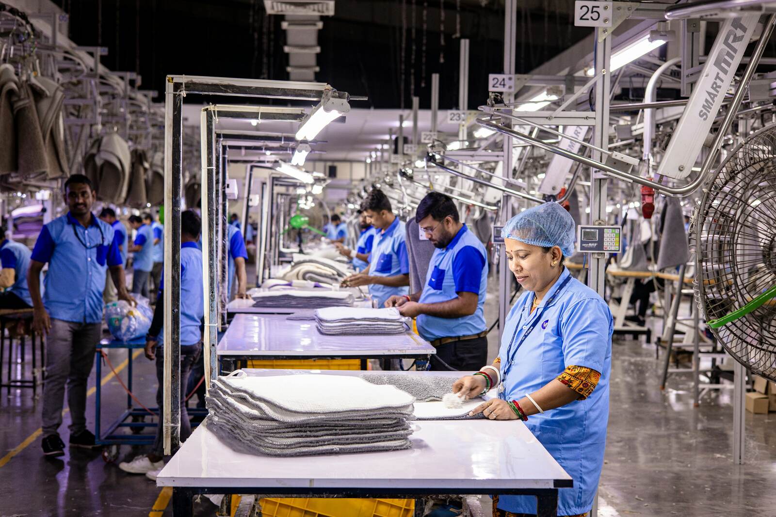 A working manufacturing floor with machines running across several lanes